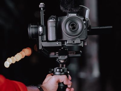 Close-up of hands gripping the floor, showing stability and control.